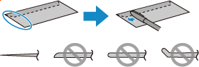 Image showing using a pen to flatten the leading edge of envelopes